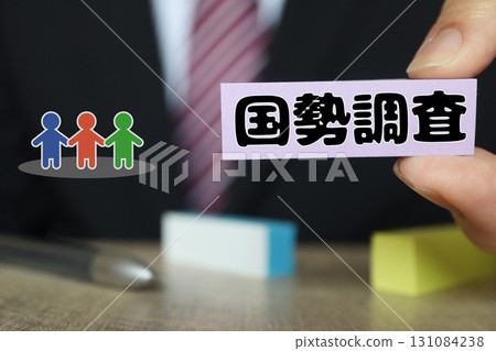 A photo of a man in a suit and sticky notes representing the census A photo of a man in a suit and sticky notes representing the census 131084238