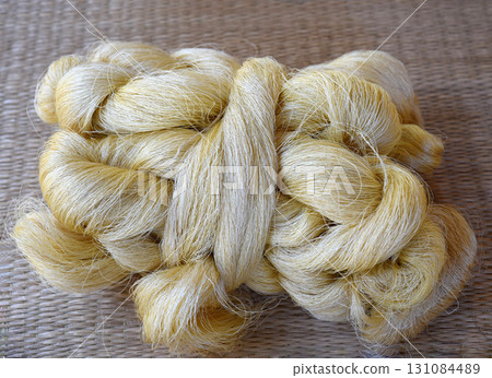 Tie a yarn of silk. Raw materials prepared for dyeing and weaving into beautiful silk. 131084489