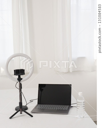 Video streaming set on a white desk 131084583