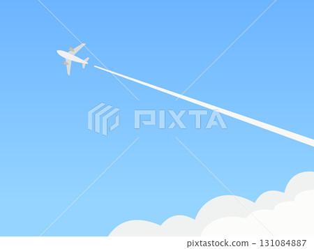一架飛機在天空中優雅飛行，其尾跡在藍天中 131084887