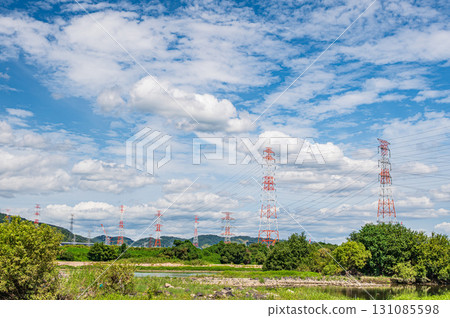 Power line tower standing on the banks of the Yodo River, Takatsuki City, Osaka Prefecture 131085598