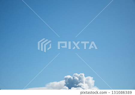 Wide blue sky and clouds 131086389