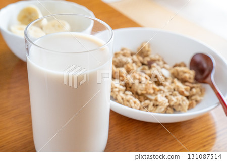 Soy milk and oatmeal granola breakfast image Soy milk and oatmeal granola breakfast image 131087514