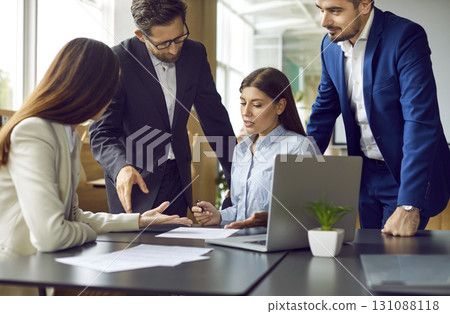 Group of business people having a meeting in office, signing a contract on workplace. Group of business people having a meeting in office, signing a contract on workplace. 131088118