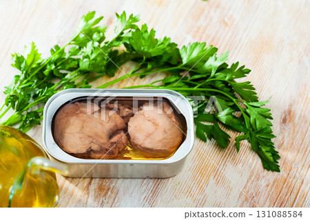 Canned cod liver in oil and parsley 131088584