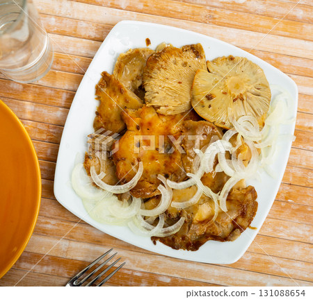 Pickled russula delica with onions Pickled russula delica with onions 131088654