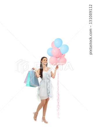 Woman with shopping bags and balloons, isolated on white, PNG Woman with shopping bags and balloons, isolated on white, PNG 131089112