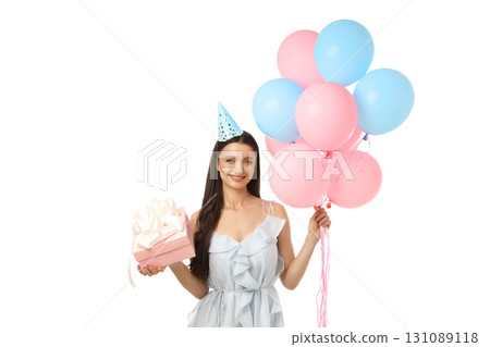 Young woman holds festive balloons and a gift box, isolated on white, PNG 131089118