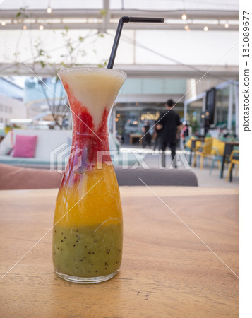 [Jordan] Colorful fruit juice in a glass on the terrace of a shopping mall in the capital, Amman 131089677