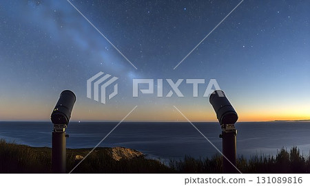 Two Telescopes Gaze at the Milky Way Over the Ocean at Dusk 131089816