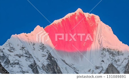 Himalayan Peak Bathed in Sunrise's Pink Glow Himalayan Peak Bathed in Sunrise's Pink Glow 131089891