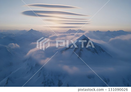 Lenticular Clouds Hovering Above Snow-Capped Mountain Peaks at S Lenticular Clouds Hovering Above Snow-Capped Mountain Peaks at S 131090026