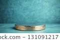 Smooth Matte Silver Round Podium on a Textured Turquoise Background 131091217