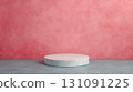 Luxury Round Podium with Polished Surface against Pink Textured Background 131091225