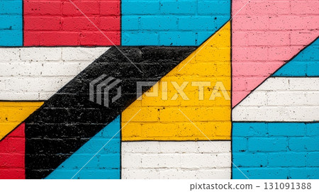 Vibrant Abstract Graffiti Art on Brick Wall with Geometric Shapes and Colors 131091388