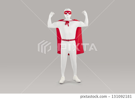 Funny man disguised as superhero standing on gray background and showing strong arms Funny man disguised as superhero standing on gray background and showing strong arms 131092181