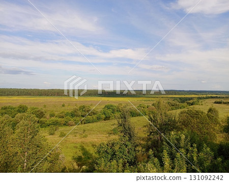 Beautiful distant landscape of forest, river, fields of the middle zone Beautiful distant landscape of forest, river, fields of the middle zone 131092242