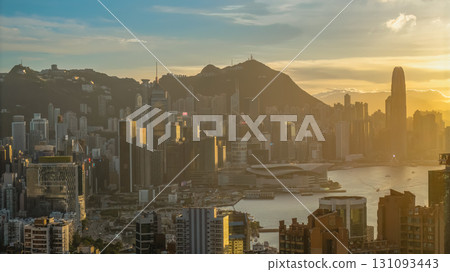 Aug 1 2025 Scenic Urban Skyline of Modern City at Sunset with Mountain 131093443