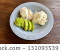 Rice ball with avocado and sesame on wooden table, Thai food Rice ball with avocado and sesame on wooden table, Thai food 131093539