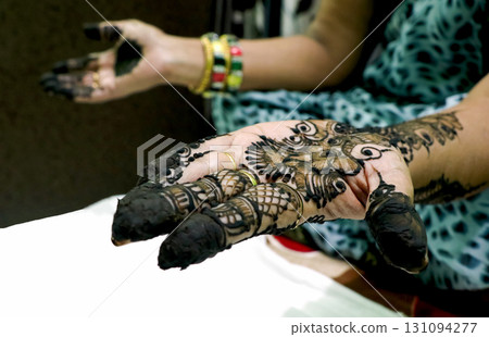 Fresh Mehndi Design on Hands with Intricate Patterns 131094277