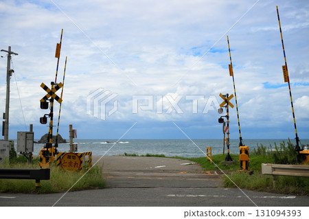 A railroad crossing near Orii Station in Shimane Prefecture A railroad crossing near Orii Station in Shimane Prefecture 131094393