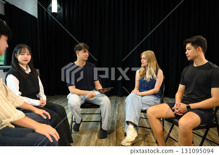 Young adults in a counseling group sharing experiences during a mental health session Young adults in a counseling group sharing experiences during a mental health session 131095094