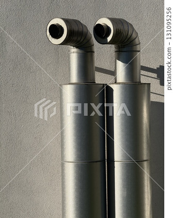 Detailed CloseUp View of a Dual Exhaust System in Automobile Design 131095256