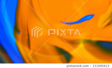 Vivid abstract macro photograph featuring a blend of bright blue and orange colors with smooth gradients and fluid shapes. Perfect for modern art backgrounds 131095623