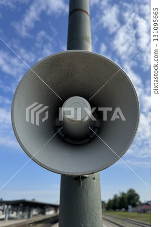 A Street Megaphone is Standing Proudly and Clearly Against a Bright Blue Sky Above Us A Street Megaphone is Standing Proudly and Clearly Against a Bright Blue Sky Above Us 131095665