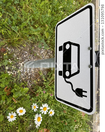 Sign for Electric Vehicle Charging Station a vital resource for ecofriendly transportation Sign for Electric Vehicle Charging Station a vital resource for ecofriendly transportation 131095798