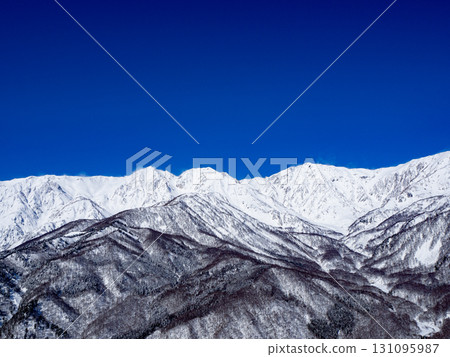 Clear skies and the Northern Alps in winter, Hakuba Village, Nagano Prefecture Clear skies and the Northern Alps in winter, Hakuba Village, Nagano Prefecture 131095987