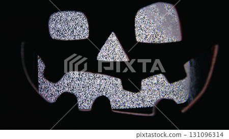 Jack O Lantern With TV Static Face Close-up Jack O Lantern With TV Static Face Close-up 131096314