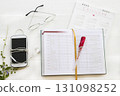 notebook, mobile phone and calendar for planner business work  131098252