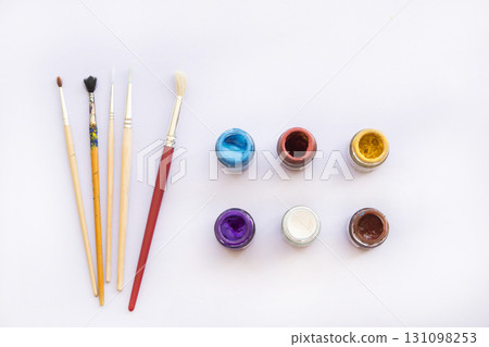 paints, brush and color drawing of lifestyle arrangement flat lay style 131098253