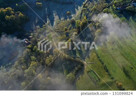 Aerial view of autumn countryside homestead and farmland 131099824
