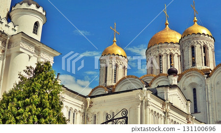 An ancient Christian Orthodox church stands against a blue sky backdrop. An ancient Christian Orthodox church stands against a blue sky backdrop. 131100696