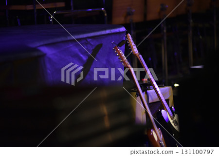 Electric guitars on the stage at live concert Electric guitars on the stage at live concert 131100797