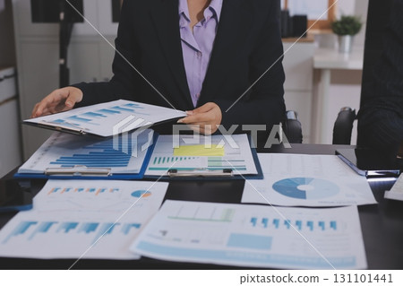 Team of business people working together in the meeting room office,teamwork background charts and graphs banner, double exposure successful teamwork,business planning concept. 131101441
