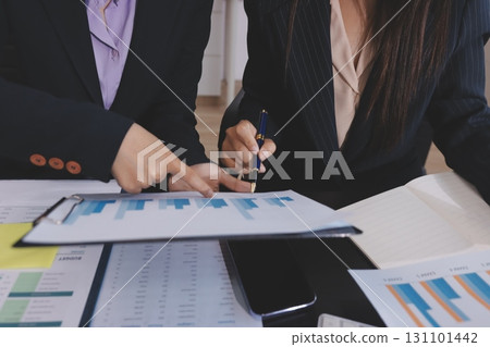 Team of business people working together in the meeting room office,teamwork background charts and graphs banner, double exposure successful teamwork,business planning concept. Team of business people working together in the meeting room office,teamwork background charts and graphs banner, double exposure successful teamwork,business planning concept. 131101442