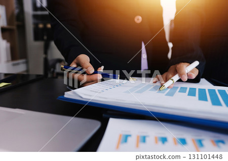 Team of business people working together in the meeting room office,teamwork background charts and graphs banner, double exposure successful teamwork,business planning concept. Team of business people working together in the meeting room office,teamwork background charts and graphs banner, double exposure successful teamwork,business planning concept. 131101448