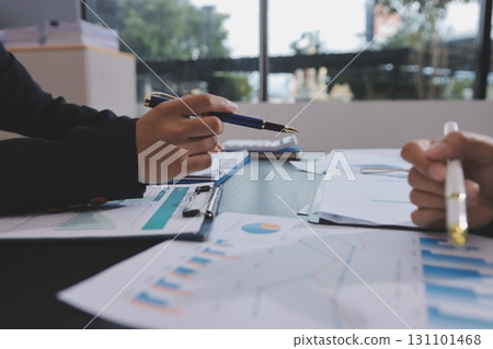 Team of business people working together in the meeting room office,teamwork background charts and graphs banner, double exposure successful teamwork,business planning concept. 131101468