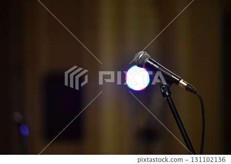 Microphone on stage close-up. Mic closeup. Karaoke, night club, bar. Music concert 131102136