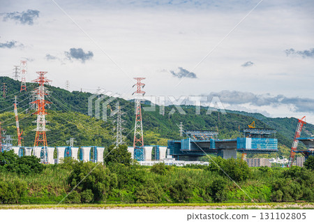 Power line tower standing on the banks of the Yodo River, Takatsuki City, Osaka Prefecture 131102805