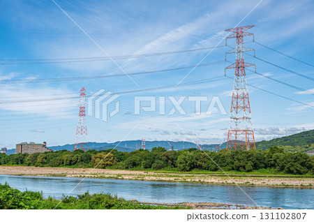 Power line tower standing on the banks of the Yodo River, Takatsuki City, Osaka Prefecture 131102807