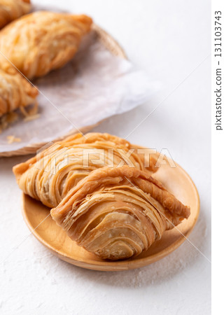 Curry puff stuffed with chicken or sweet potatoes, Thai snack food style 131103743