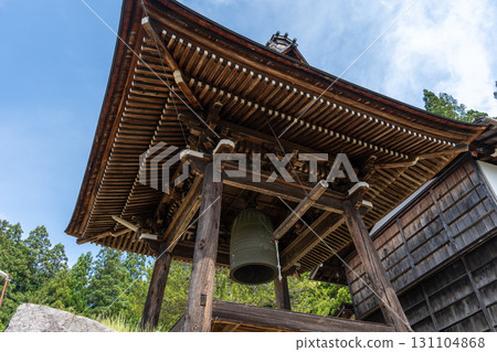 Bell tower of Soyuji Temple in Takayama, Japan under blue sky 131104868