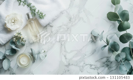 Top view spa background, elegant oil bottle, towel, eucalyptus, white marble, space design. 131105483