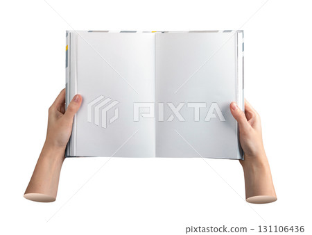 Hand is holding a book open to blank pages. The sheet is clean and empty, offering space for reading Hand is holding a book open to blank pages. The sheet is clean and empty, offering space for reading 131106436