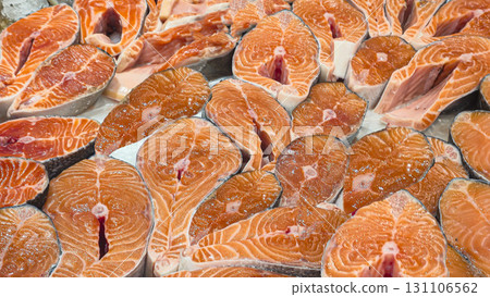 Frozen sea and freshwater fish on a supermarket shelf Sliced and whole Seafood Frozen sea and freshwater fish on a supermarket shelf Sliced and whole Seafood 131106562