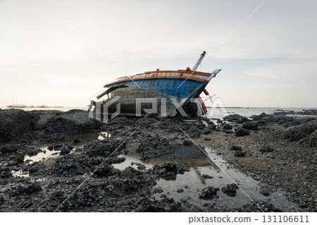 Old wrecked fishing boat on coast of Ang Sila Village, Chonburi Province of thailand. Old wrecked fishing boat on coast of Ang Sila Village, Chonburi Province of thailand. 131106611